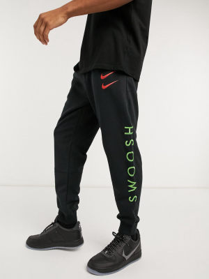 Nike Swoosh Cuffed Sweatpants In Black