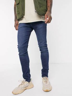 Levi's Skinny Tapered Fit Jeans In Sage Overt Advance Stretch Dark Wash