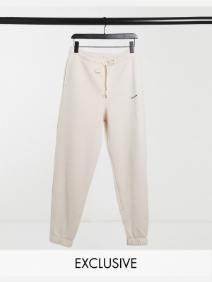 Collusion Unisex Oversized Logo Print Sweatpants In Ecru