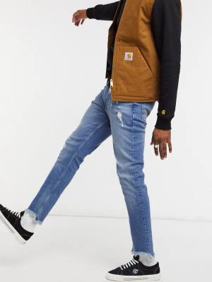 Asos Design Skinny Jeans In Vintage Dark Wash Blue With Rips And Raw Hem