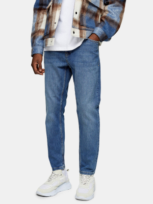 Mid Wash Stretch Tapered Jeans