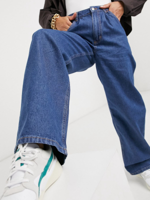 Asos Design High Rise 'relaxed' Dad Jeans With Pleat Front In Midwash
