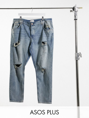 Asos Design Plus Tapered Jeans In Vintage Light Wash Blue With Heavy Rips