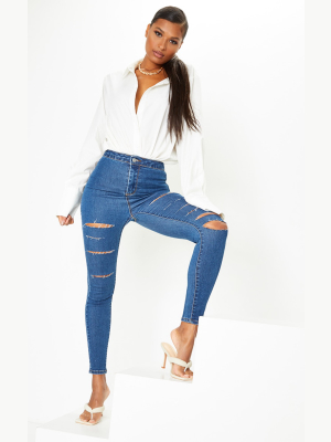 Prettylittlething Mid Blue Wash Rip Distressed...