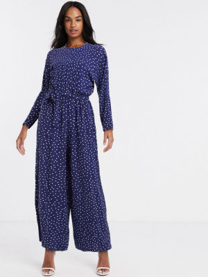 Asos Design Tie Waist Jumpsuit With Long Sleeves In Navy Polka Dot