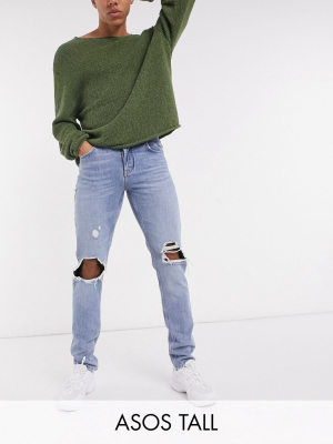 Asos Design Tall Slim Jeans In Vintage Light Wash With Knee Rips