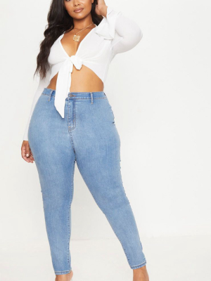 Plus Light Wash High Waisted Skinny Jeans