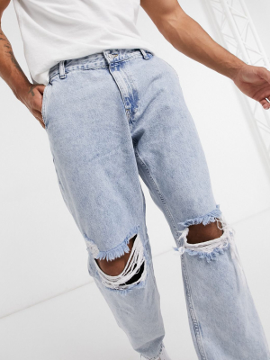 Bershka 90's Fit Jeans With Knee Rips In Washed Blue