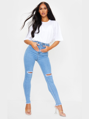 Prettylittlething Light Blue Wash Open Knee Raw...