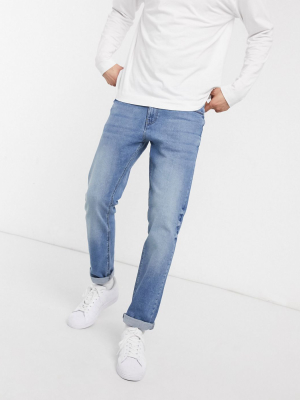 Asos Design Stretch Slim Jeans In Mid Wash Blue
