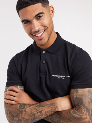 Abercrombie & Fitch Graphic Chest Logo Polo In Black