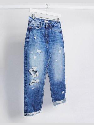 River Island Carrie Ripped Mom Jeans In Mid Blue