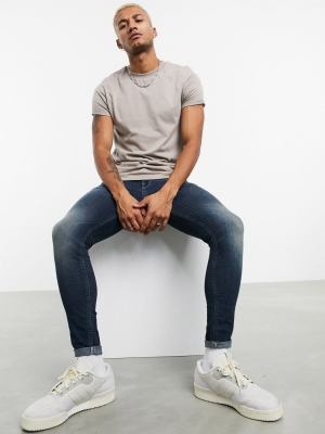 Asos Design Spray On Jeans In Power Stretch Denim In Tint