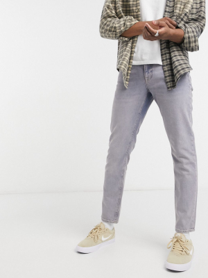 Asos Design Slim Jeans In Tinted Vintage Light Wash