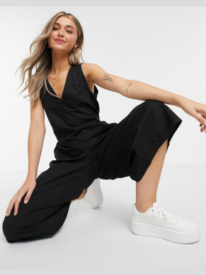 Asos Design Soft Denim Slouchy V Neck Jumpsuit In Black