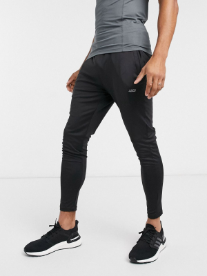 Asos 4505 Icon Training Super Skinny Sweatpants With Quick Dry In Black