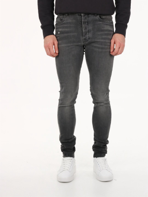 Amiri Distressed Slim Jeans