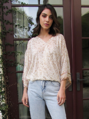 All That Glitters Metallic Floral Surplice Top