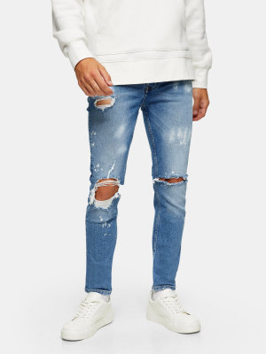 Mid Wash Ripped Paint Skinny Jeans