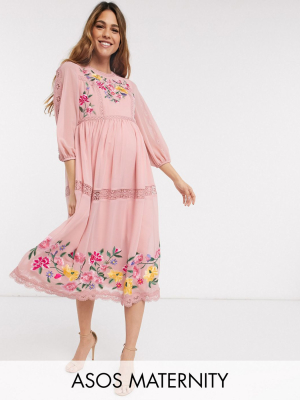 Asos Design Maternity Embroidered Midi Skater Dress With Lace Trims And Puff Sleeves In Soft Pink