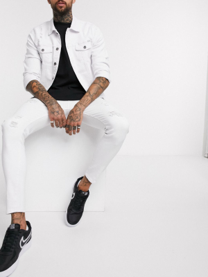 Liquor N Poker Skinny Fit Jeans With Abrasions In White