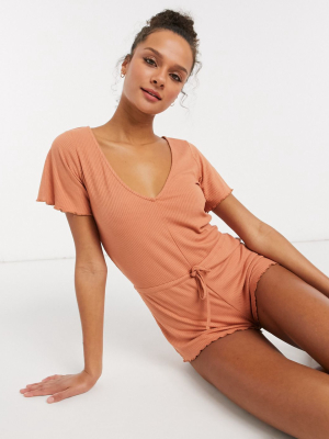 Asos Design Rib Jersey Pajama Romper With Waist Tie And Lettuce Hem In Orange