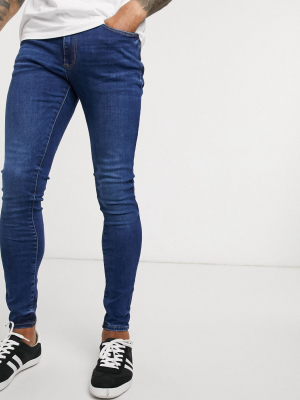 River Island Spray On Jeans In Dark Blue Wash