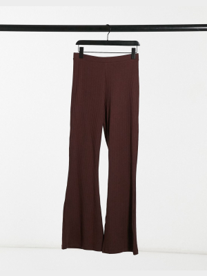 Asos Design Rib Kick Flare Legging In Dark Brown