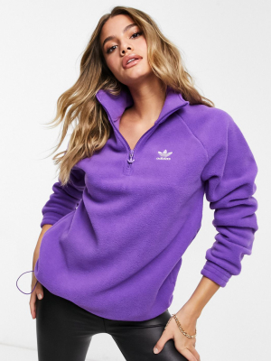 Adidas Originals Logo Quarter Zip Fleece Top In Purple