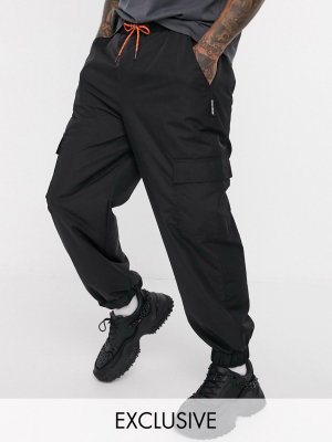 Collusion Nylon Cargo Pants With Pockets In Black