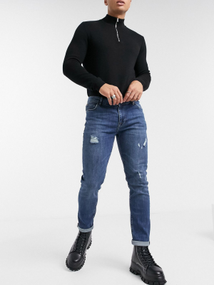 Asos Design Skinny Jeans In Dark Blue Green Cast Wash With Abrasions