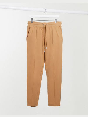 Asos Design Smart Co-ord Tapered Sweatpants With Pintucks In Camel Brown Pique