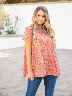 The Michelle Babydoll Top - Red/orange Floral