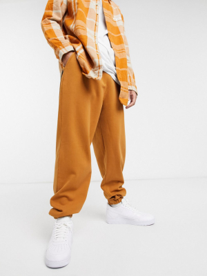 Asos Design Super Oversized Sweatpants In Washed Brown