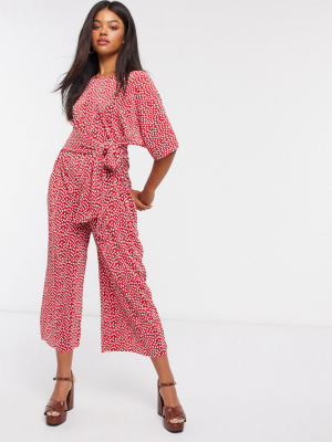 Asos Design Jersey Kimono Sleeve Plisse Jumpsuit With Tie Waist In Red Spot