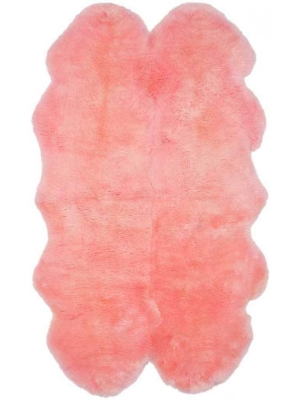 Sheepskin Pelt Solid Pink Area Rug