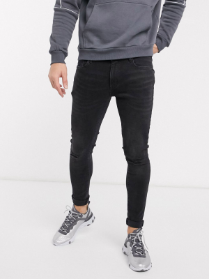 River Island Spray On Skinny Jeans In Washed Black