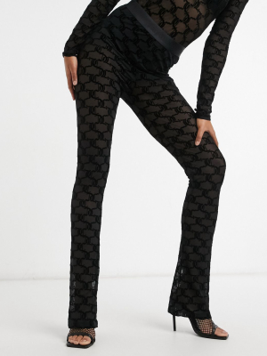 Juicy Couture Coordinating Flocked Mesh Flared Logo Pants In Black