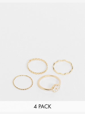 Asos Design Pack Of 4 Rings With Daisy Flower In Gold Tone