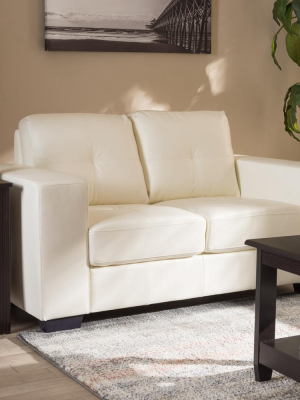 Adelyn White Faux Leather Sofa