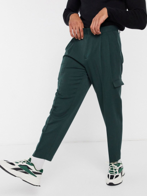 Asos Design Oversized Tapered Smart Pants In Dark Green With Cargo Pockets