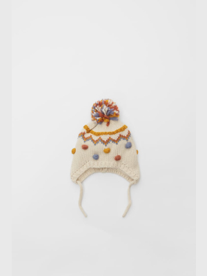 Knit Hat With Embroidered Bobbles