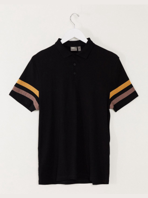 Asos Design Organic Polo Shirt With Contrast Sleeve Stripes In Black