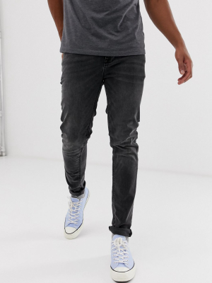 Asos Design Skinny Jeans In Washed Black