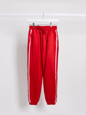 The Couture Club Stripe Side Seam Detail Oversized Sweatpants In Red