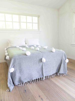 Gray Blanket With White Pom Poms