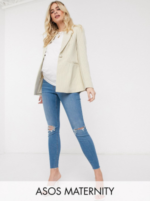 Asos Design Maternity High Rise Ridley 'skinny' Jeans In Lightwash Blue With Knee Rips And Raw Hem With Under Bump