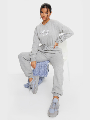 Prettylittlething Grey Printed Sweat Jumpsuit