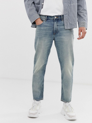 Asos Design Classic Rigid Jeans In Vintage Dirty Wash Blue