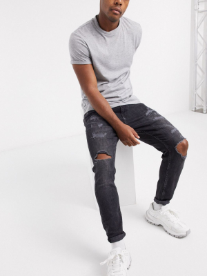 Pull&bear Carrot Fit Jeans With Rips In Black